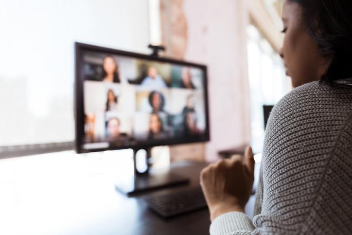 Woman attending virtual meeting