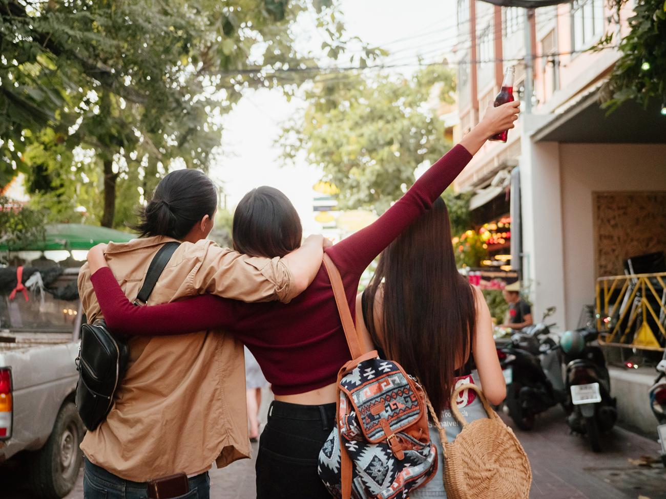 Adolescents walking down the street